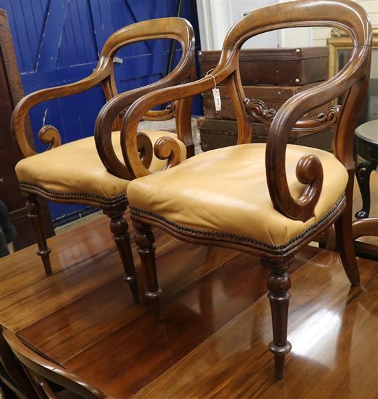 A pair of Victorian carvers and six single dining chairs